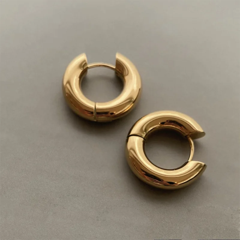 Luna Bold Round Huggies Earrings.