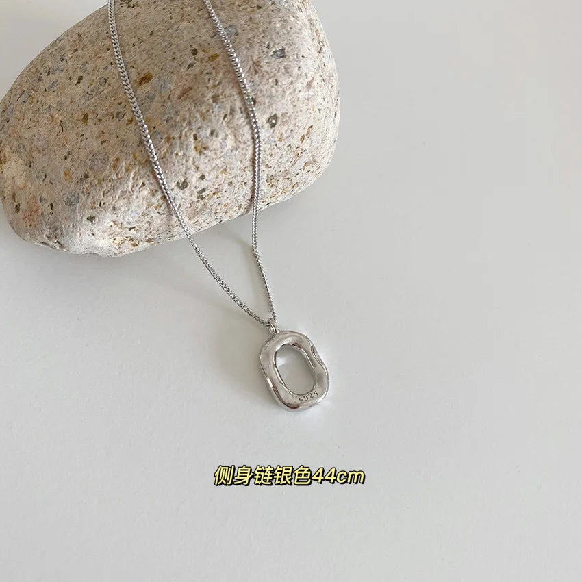 Élan Geometry Statement Necklace