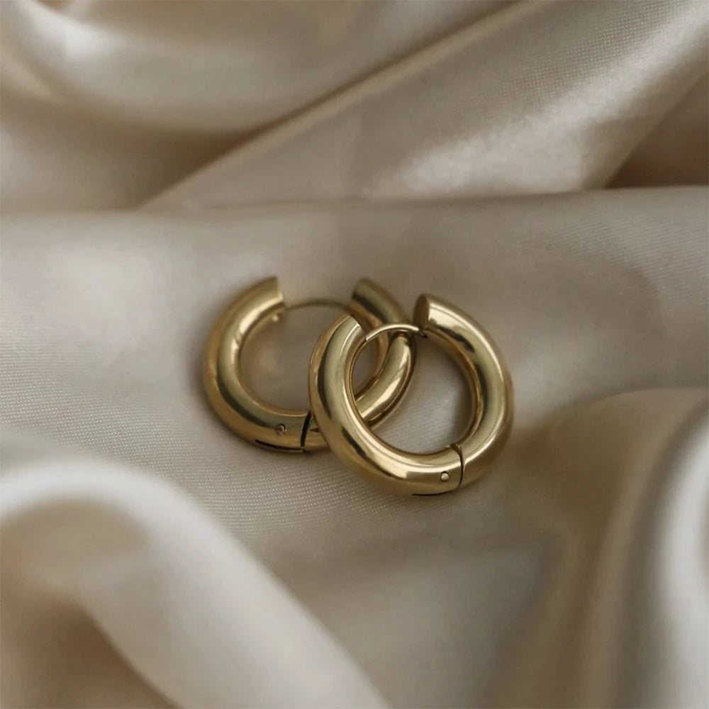 Luna Bold Round Huggies Earrings.